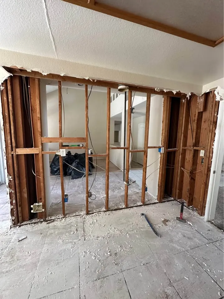 Wall stripped to studs with wiring still in place